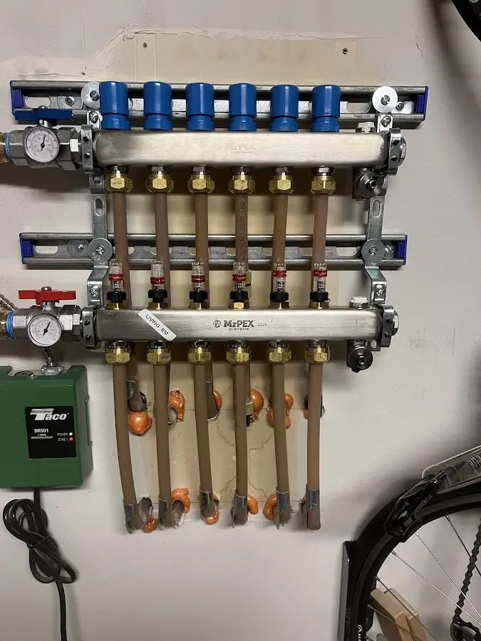 Plumber performing Water Heater Repair at a residential property in Mattoon